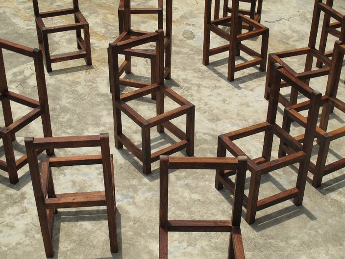 Photo: WORKSHOP Architecture The frames of chairs given to each family to complete using the traditional craft of jute weaving.  