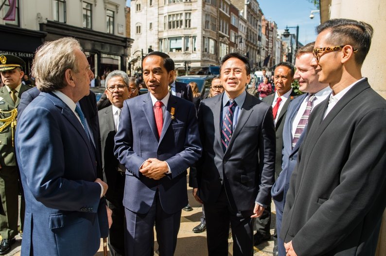President Joko being greeted by designer Toton, Ed Vaizey and Mark Fenwick 