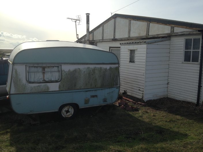 Caravan and 'self-built' dwelling photo by Joel Mills